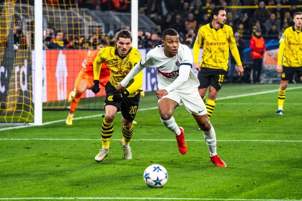 le paris saint germain retrouve le borussia dortmund en demi finale de ligue des champions attention a la marche